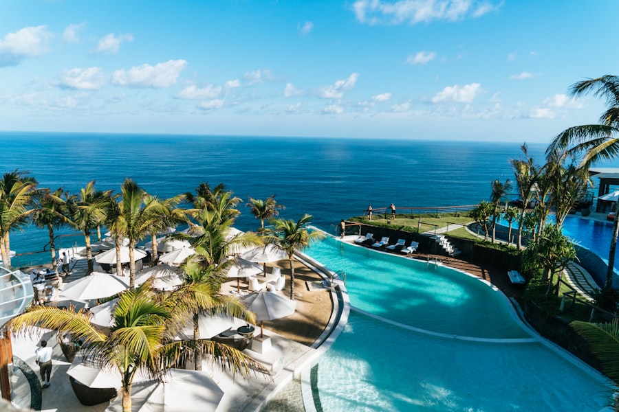 Infinity pool overlooking misty mountains